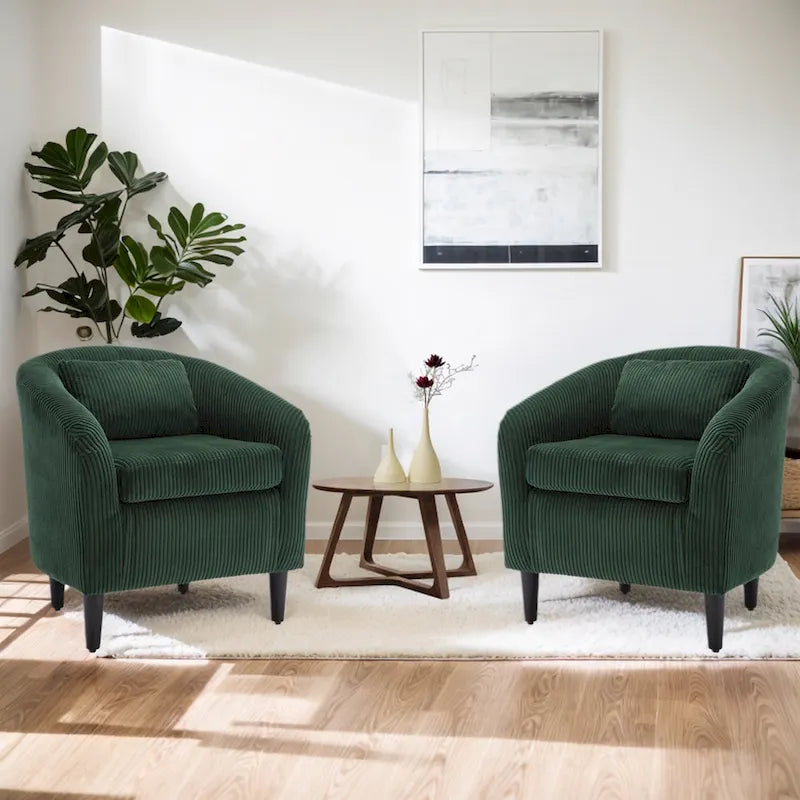 Smaragdgroene gestoffeerde kuipstoel van 24.8 met houten poten en kussens
