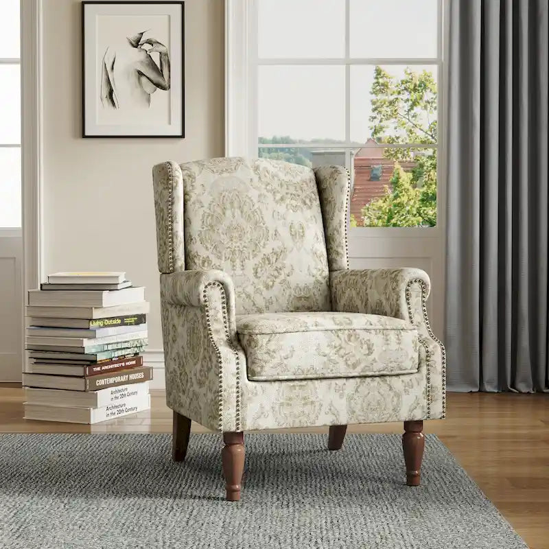 Sillón decorativo tapizado con ribete de tachuelas