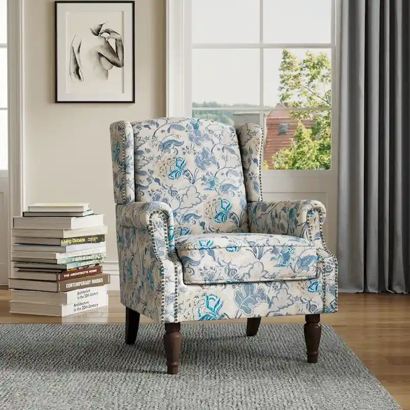Sillón decorativo tapizado con ribete de tachuelas
