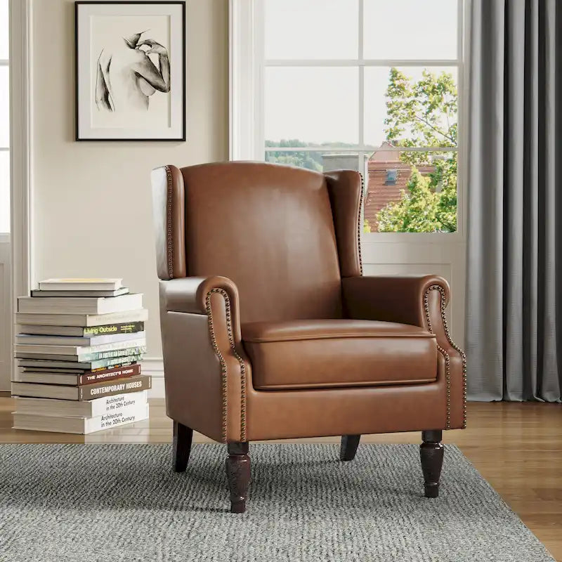 Sillón decorativo tapizado con ribete de tachuelas