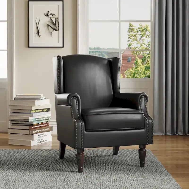 Sillón decorativo tapizado con ribete de tachuelas