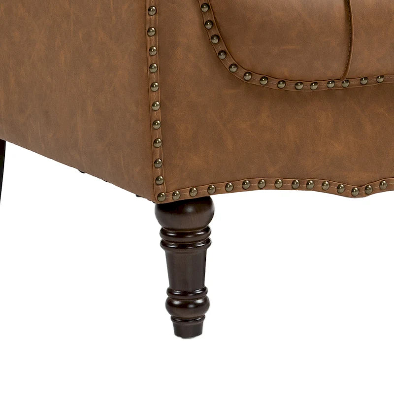 Poltrona decorativa in ecopelle con trapuntatura per il soggiorno