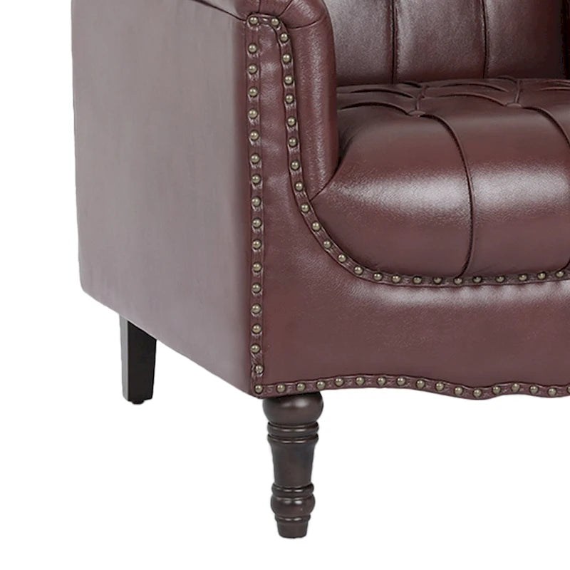 Poltrona decorativa in ecopelle con trapuntatura per il soggiorno