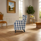 Moderne retrofauteuil van 30.25 met hoge rugleuning, bekleding en houten poten voor de woonkamer