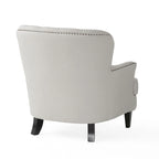 Moderni 32.5 pehmustettu klubituoli rahisarjalla ja koristeellisilla naulankannoilla olohuoneeseen