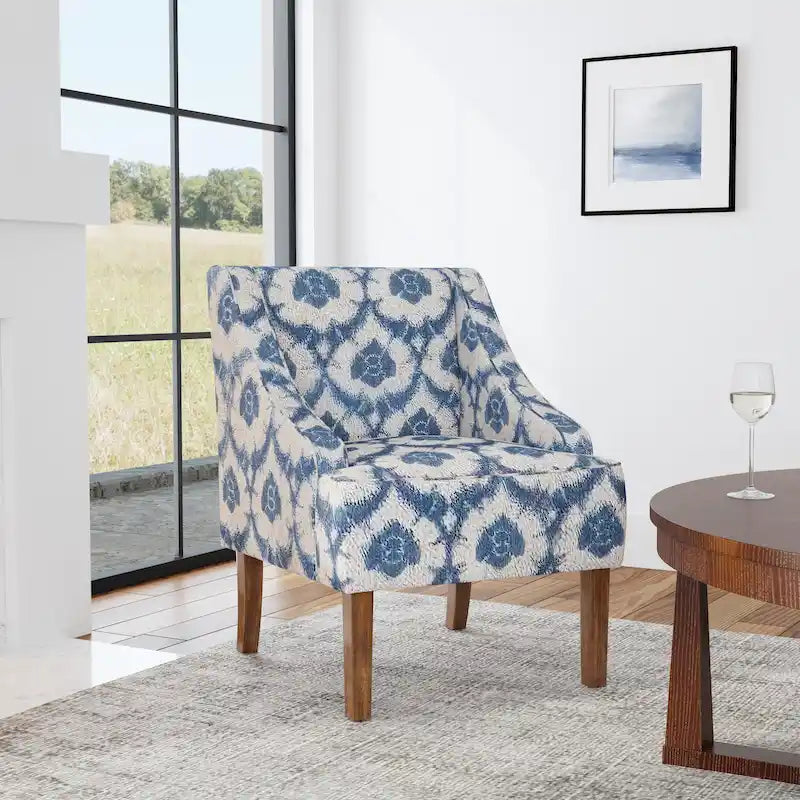 Sillón tapizado con brazos curvos Holman de Porch & Den