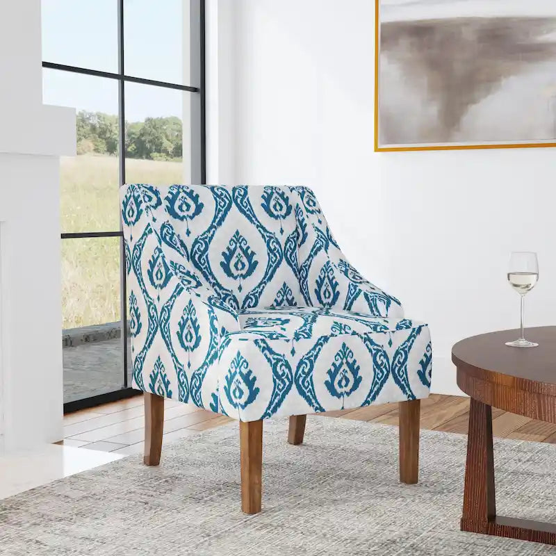 Sillón tapizado con brazos curvos Holman de Porch & Den