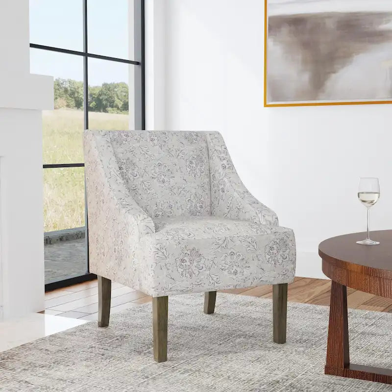 Sillón tapizado con brazos curvos Holman de Porch & Den