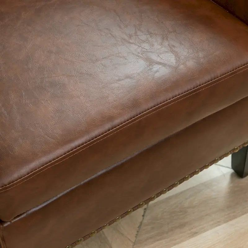 KINWELL PU-leren gestoffeerde kuipfauteuil in clubstijl met sierspijkers