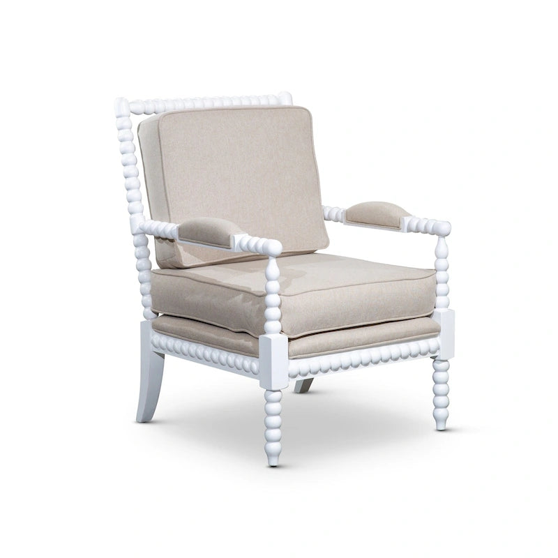 Sillón con brazos de tela y respaldo de huso