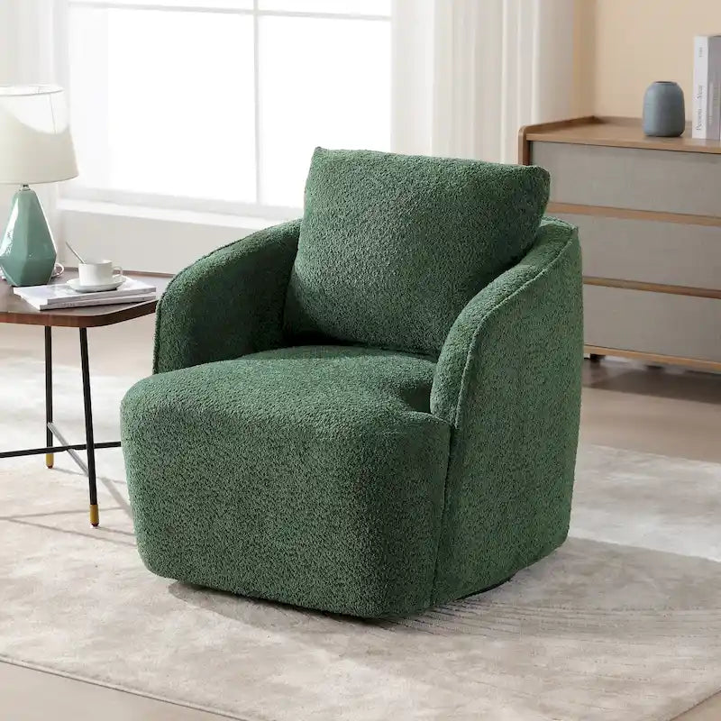 Sillón tipo barril giratorio tapizado en tela bouclé con almohada