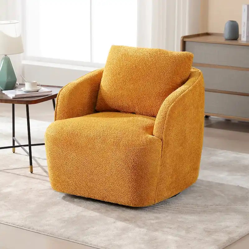Sillón tipo barril giratorio tapizado en tela bouclé con almohada