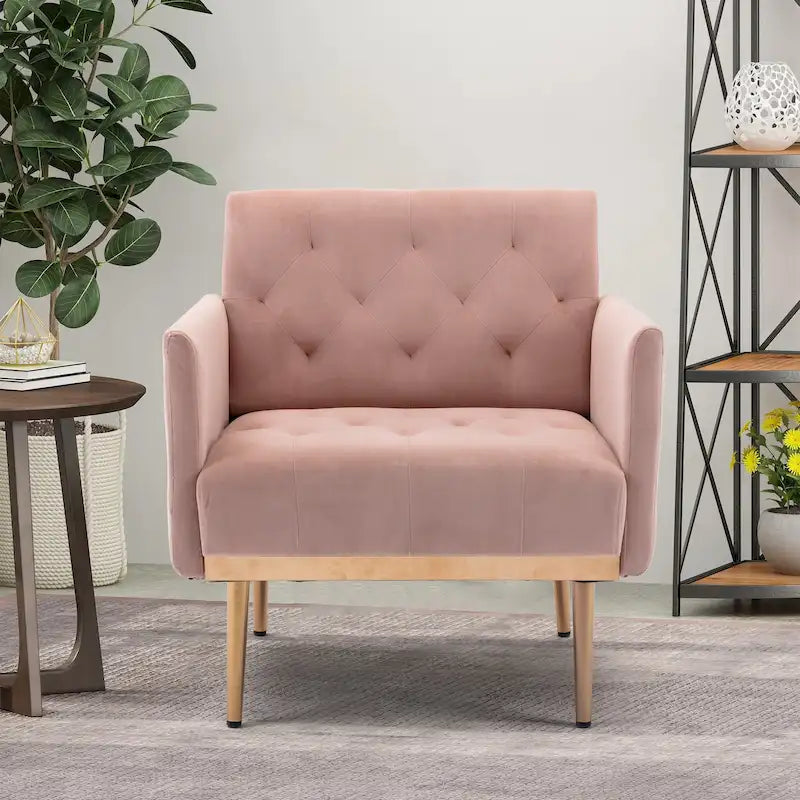 Sillón decorativo tapizado de terciopelo con capitonado y patas doradas