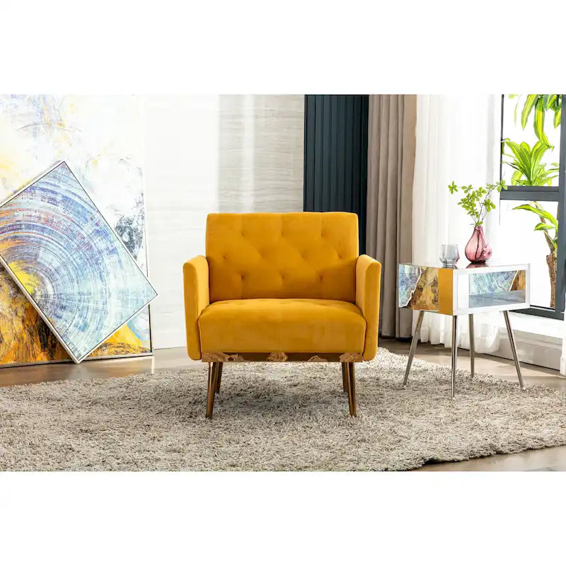 Sillón decorativo tapizado de terciopelo con capitonado y patas doradas