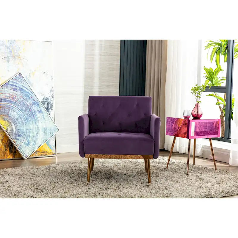 Sillón decorativo tapizado de terciopelo con capitonado y patas doradas