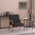 Retro moderne fauteuil van zwart kunstleer