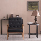 Retro moderne fauteuil van zwart kunstleer