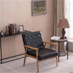 Retro moderne fauteuil van zwart kunstleer