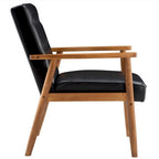 Retro moderne fauteuil van zwart kunstleer