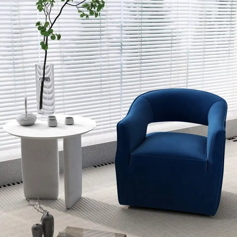 Sillón decorativo moderno y glamuroso SEYNAR de terciopelo, giratorio 360° y con respaldo abierto