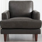 Poltrona in pelle pieno fiore Ivy Living Cassia con imbottitura in piume, memory foam e molle