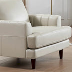 Poltrona in pelle pieno fiore Ivy Living Cassia con imbottitura in piume, memory foam e molle