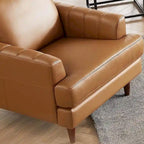 Poltrona in pelle pieno fiore Ivy Living Cassia con imbottitura in piume, memory foam e molle